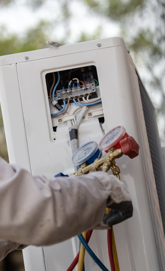 technician giving maintenance to a hvac unit florence ma